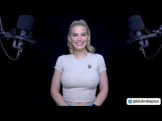 the girl very similar to margo robbie shows her chest.